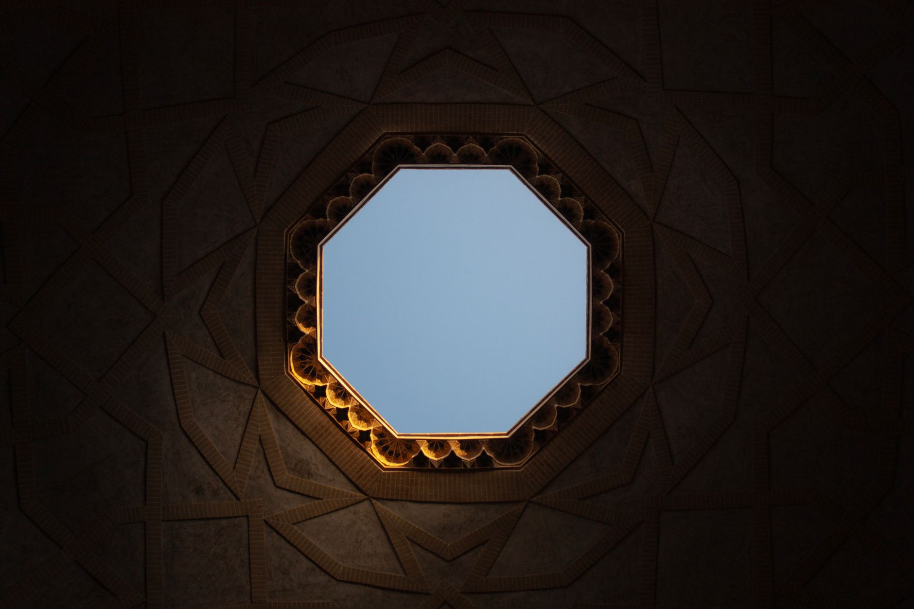 Intricate geometric ceiling design in Yazd, Iran, showcasing Persian architecture.