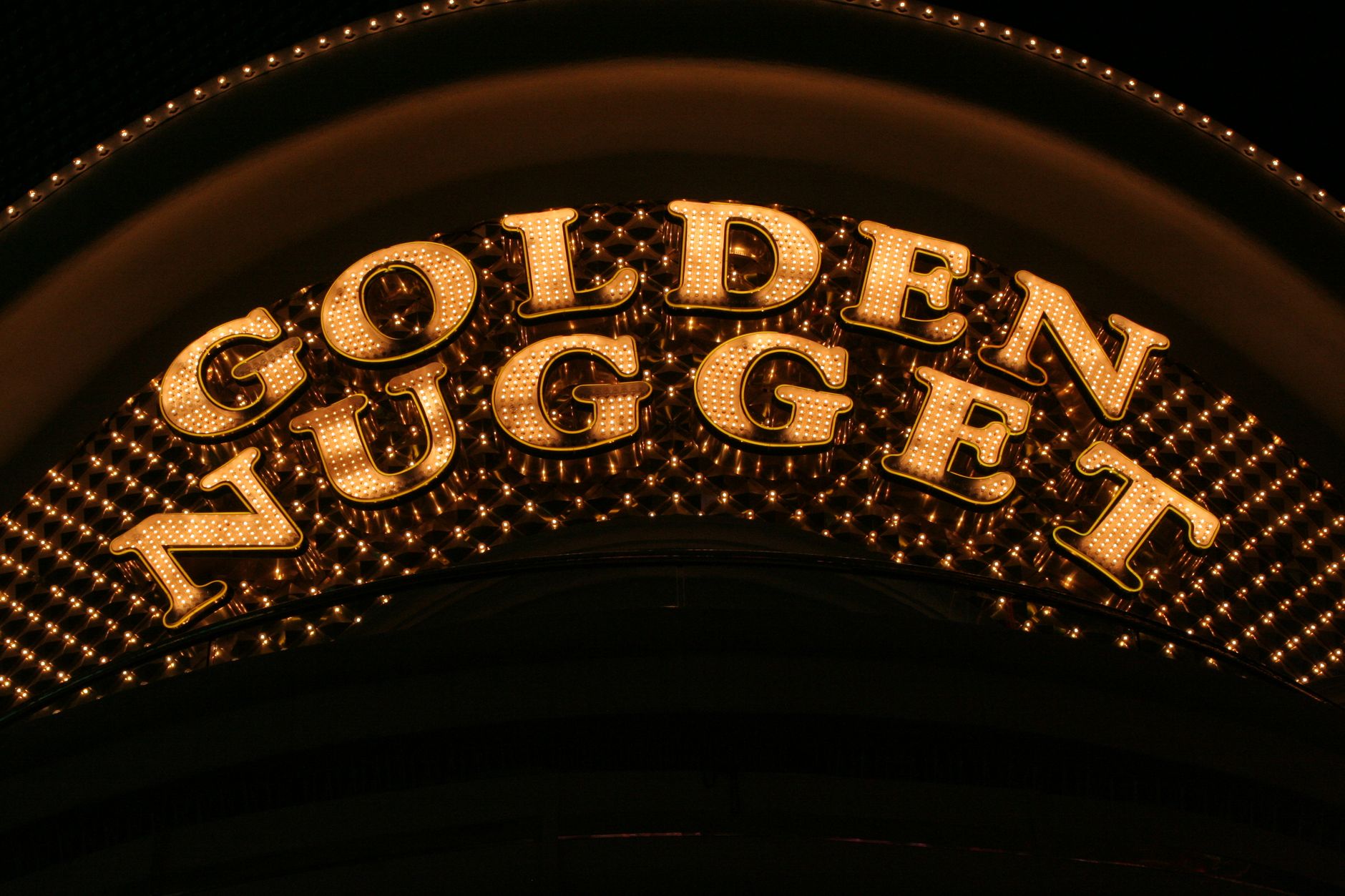 Illuminated Golden Nugget casino sign glowing brightly at night