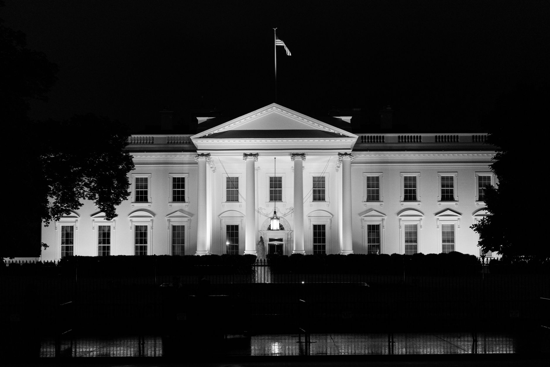 The iconic White House illuminated at night, Washington, D.C., USA.